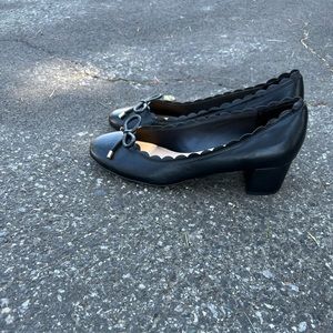 Black shoes, formal cute close front and back shoes.